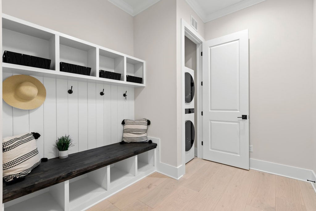 mudroom with stacked laundry - Virginia Park - Biarritz Builders